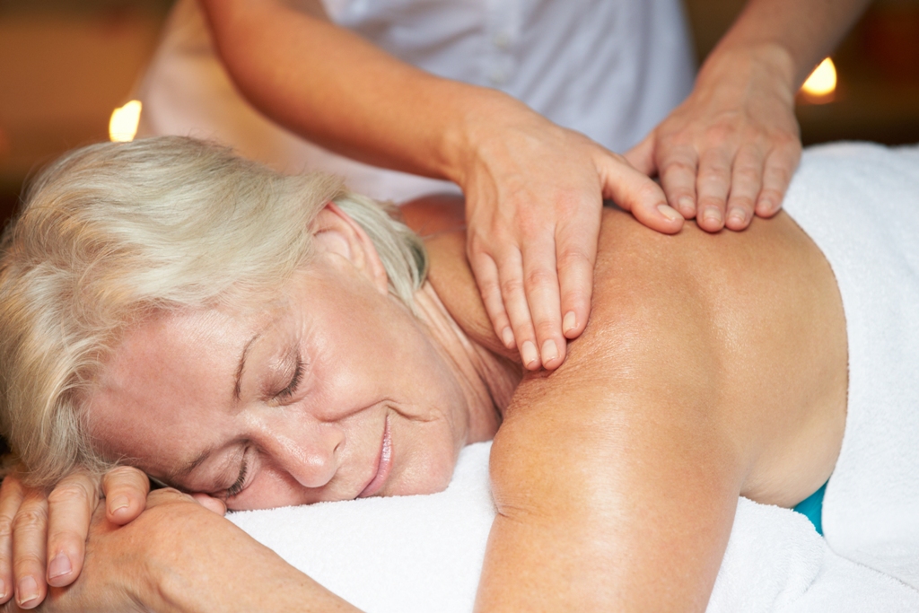 senior woman having massage